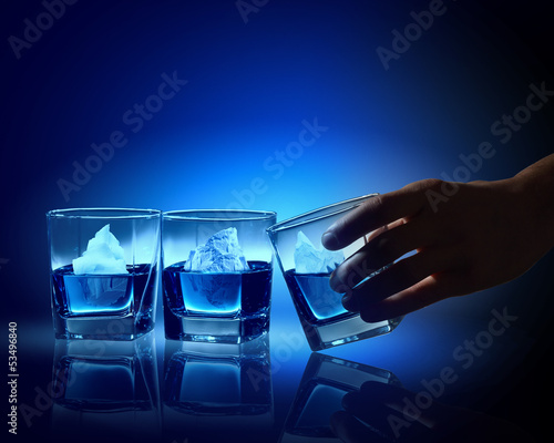 Three glasses of blue liquid © Sergey Nivens