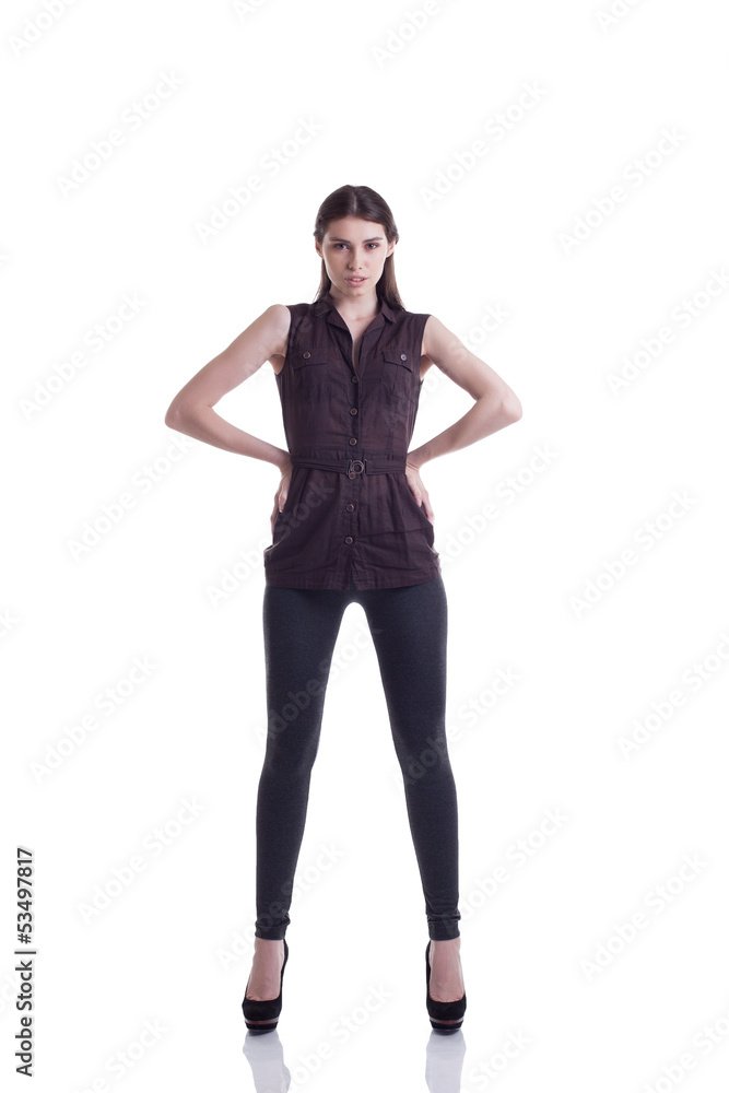 Tall slim girl posing in fashionable clothing Tall slim girl posing in fashionable clothing