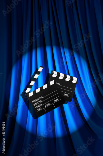 Valokuva Movie clapper board against curtain