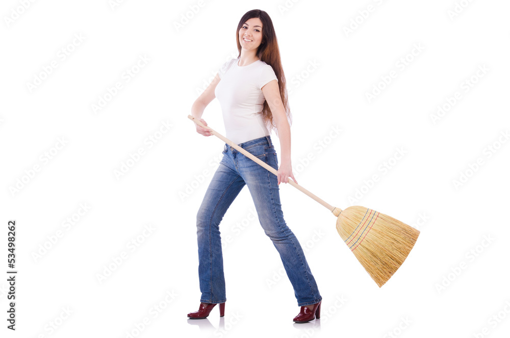 Young woman with broom isolated on white Young woman with broom isolated on white