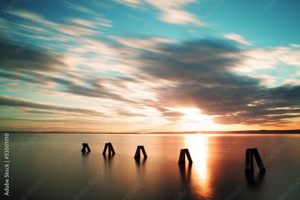 Obraz premium Zachód słońca nad oceanem