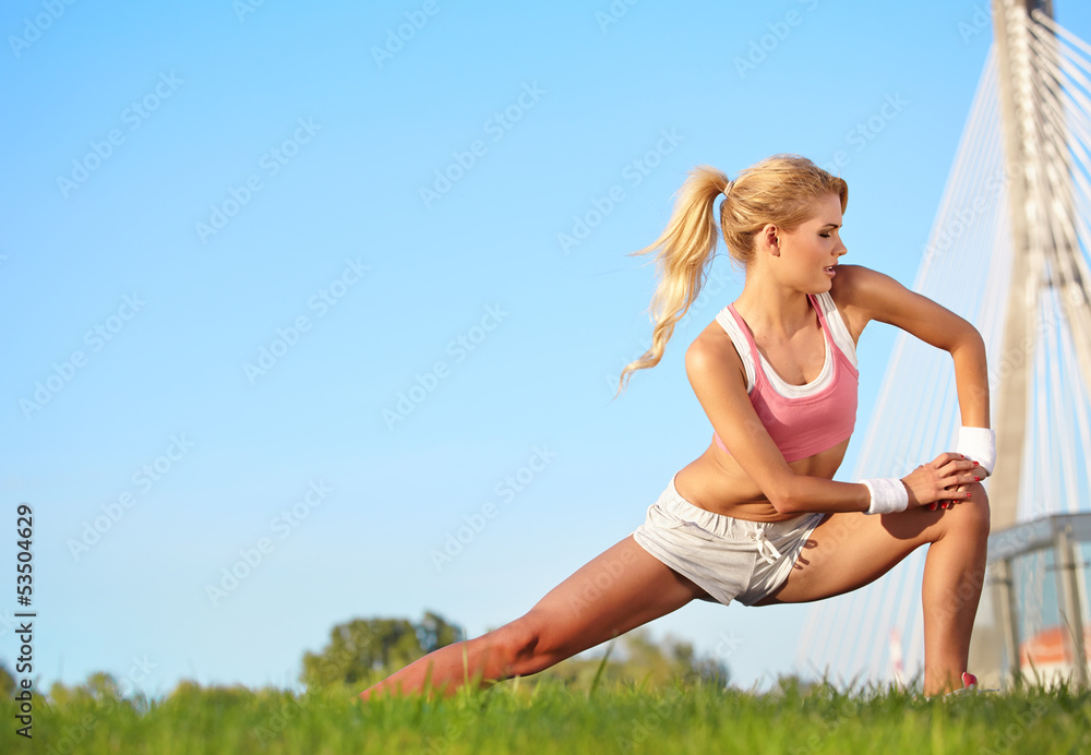 blond female fitness model outdoors blond female fitness model outdoors