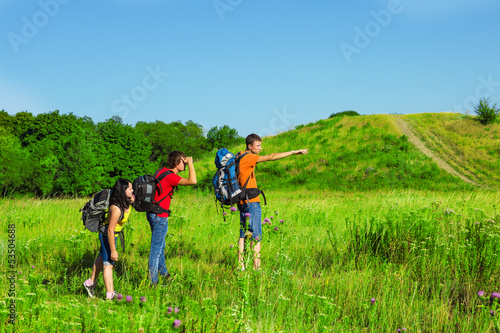 Backpackers observing the area