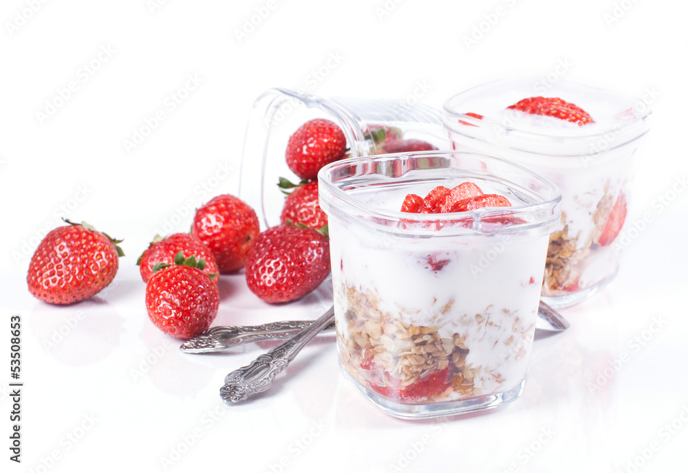 muesli, strawberries and yogurt on a white background in glasses muesli, strawberries and yogurt on a white background in glasses