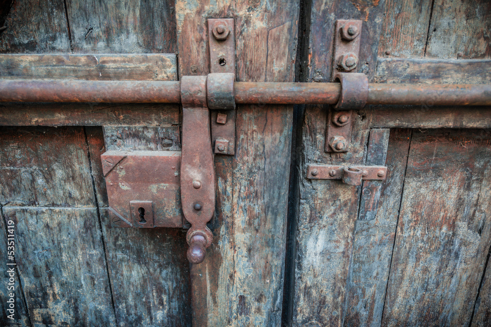 Rusty lock of old gates