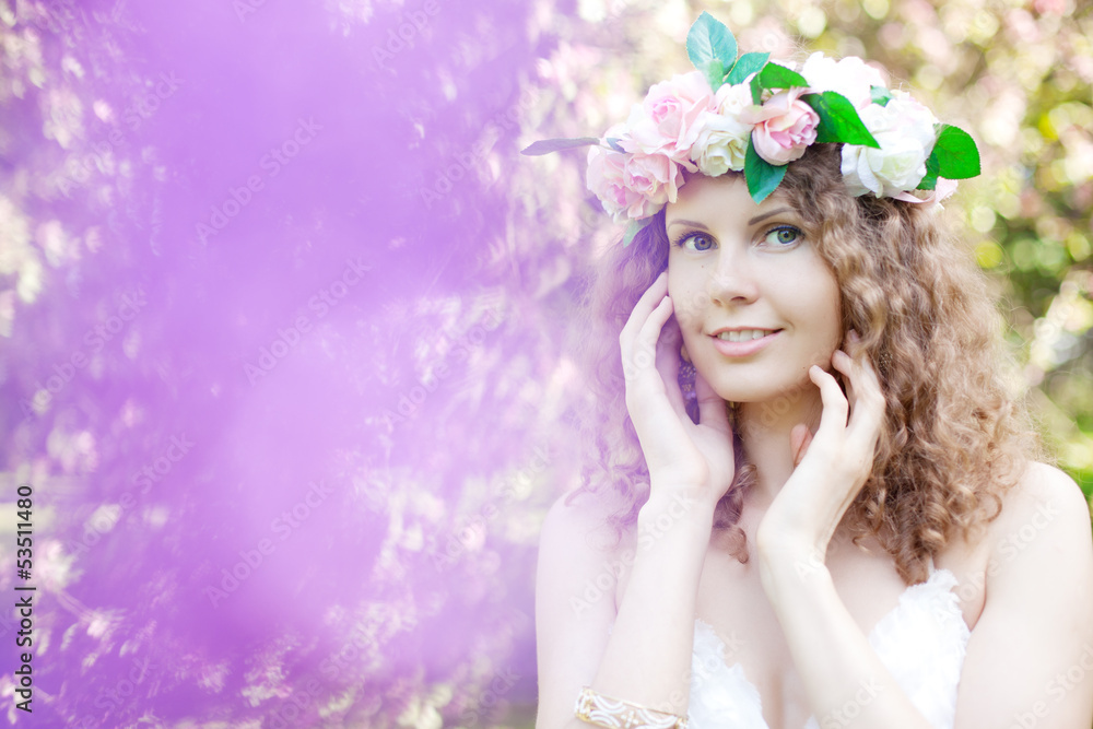 Young beauty woman in blooming garden Young beauty woman in blooming garden