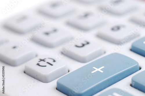 Closed-up of calculator button , plus button