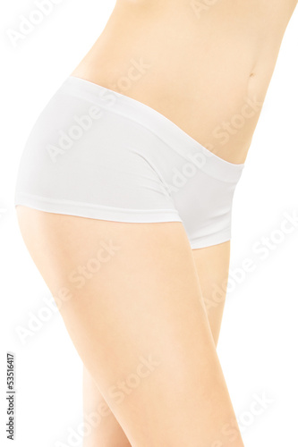 Attractive female in white cotton panties