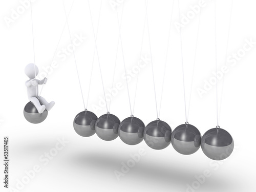 Person sitting on sphere of Newton's cradle