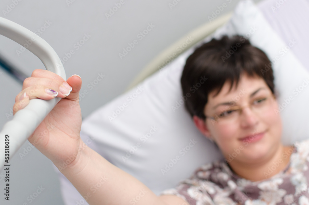 Fototapeta premium Pregnant woman in hospital - arm support