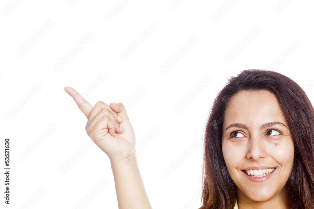 Portrait of a young beautiful woman pointing at copyspace Portrait of a young beautiful woman pointing at copyspace