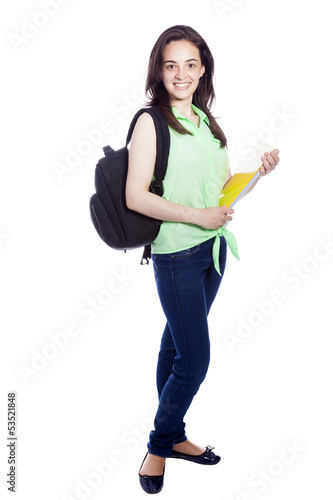 Full body portrait of a female student carring notebooks and bac