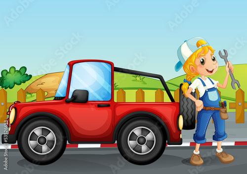 A girl repairing the red jeep