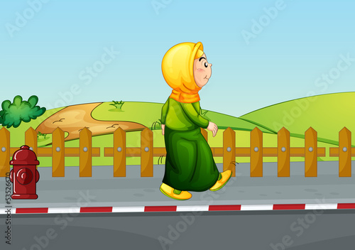 An old lady walking along the road