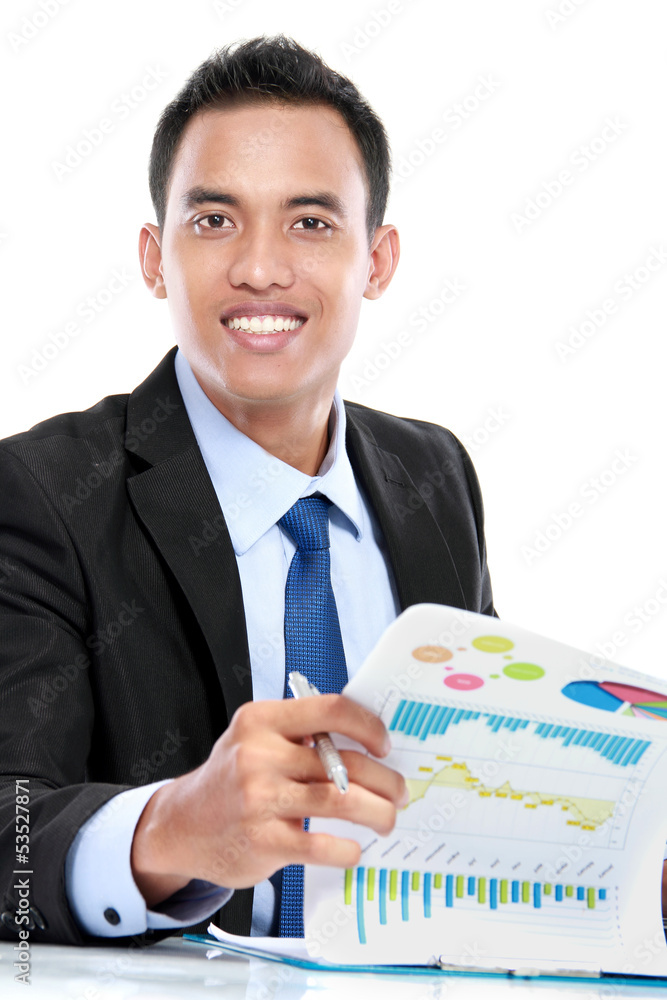 successful businessman working on report successful businessman working on report