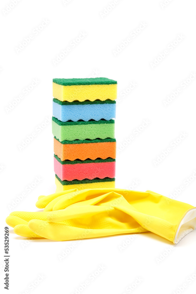 Rubber gloves and a cleaning sponges on a white background.