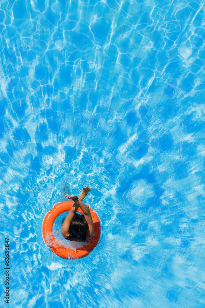 jumping in the buoy at the swimming pool
