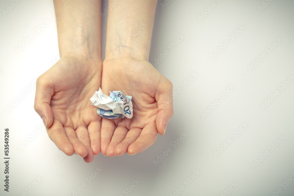 Open hands with money Open hands with money