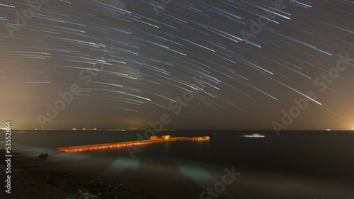 time lapse stars on the sea photo