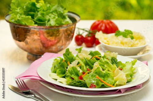 Spring salad with early vegetables and Tete de Moine cheese