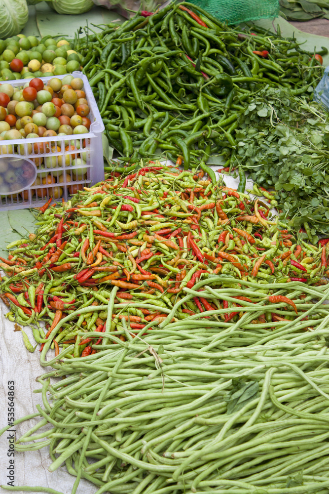 Heaps of Chili and cow-pea with other vegetables Heaps of Chili and cow-pea with other vegetables