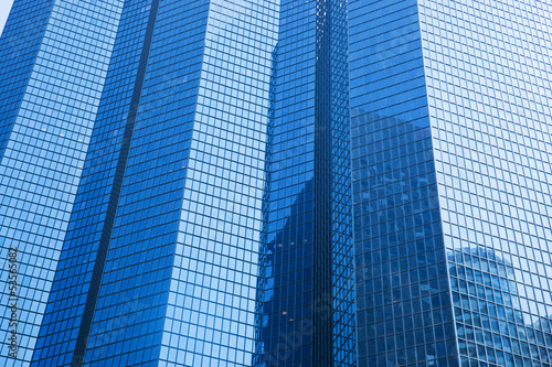 Business skyscrapers modern architecture in blue tint.