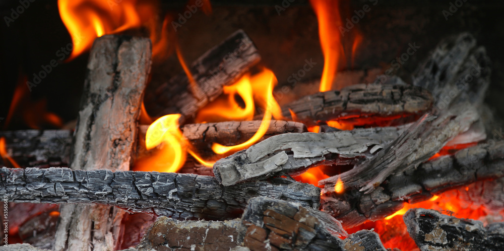 fireplace with coals burning down fireplace with coals burning down