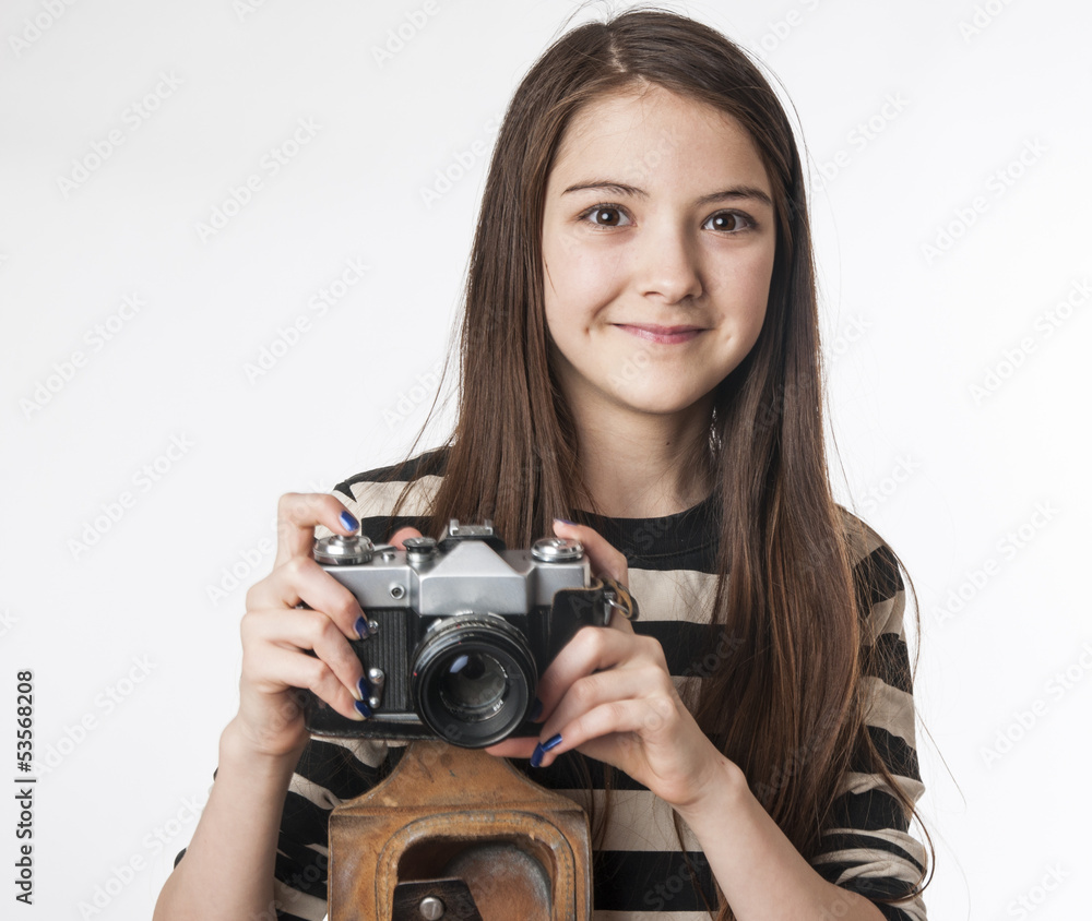 girl with old photokamera on white background girl with old photokamera on white background