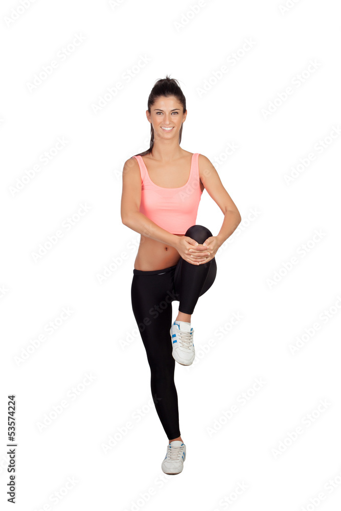 Pretty woman doing stretching into her workout Pretty woman doing stretching into her workout