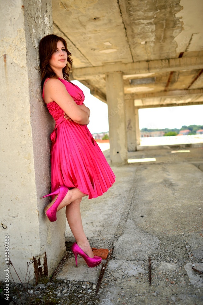 Young beauty wearing pink dress Young beauty wearing pink dress