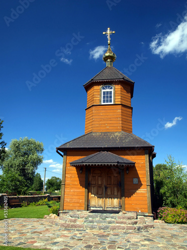 picturesque wooden Orthodox church in the village Kostomloty in