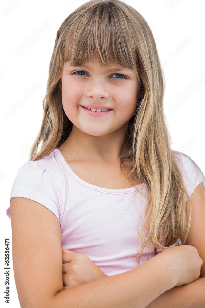 Beautiful little girl smiling with her arms crossed Beautiful little girl smiling with her arms crossed