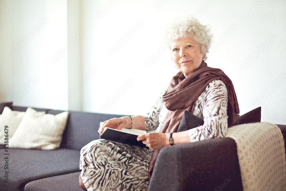 Grandmother at Home Sitting on the Couch Grandmother at Home Sitting on the Couch