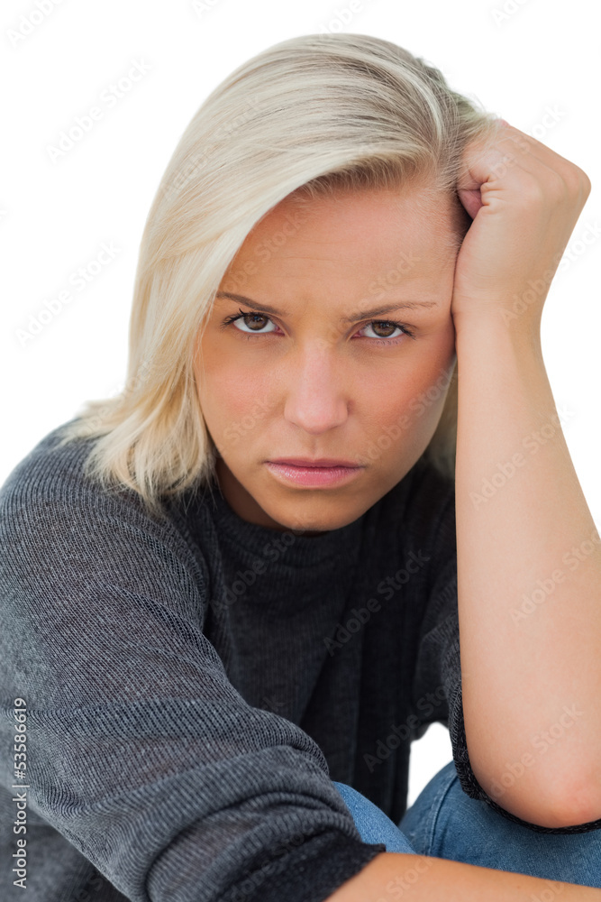Troubled woman looking at camera Troubled woman looking at camera