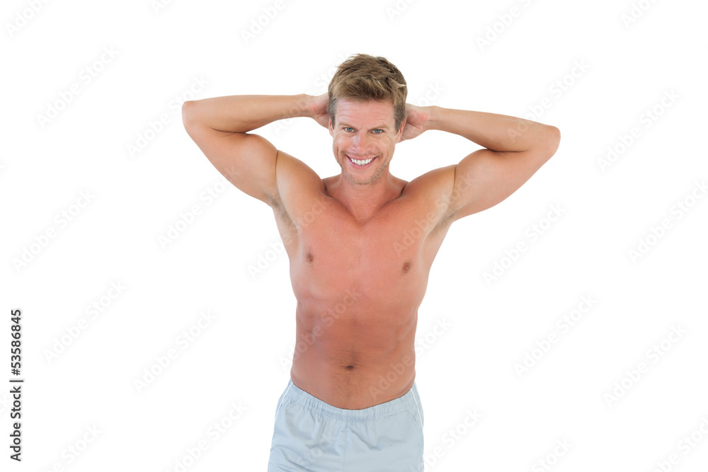 Shirtless man with hands on head