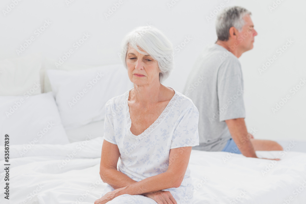 Upset woman arguing with husband Upset woman arguing with husband