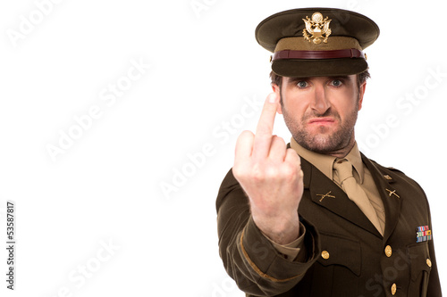 Angry army man showing middle finger