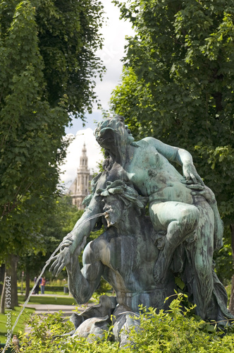 fountain sculpture Vienna Austria park with museum in backgroun