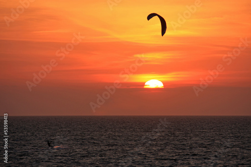 kitesurfer at sunset