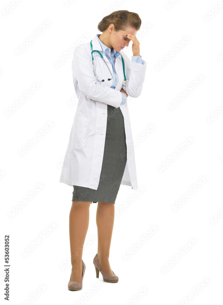 Full length portrait of concerned doctor woman Full length portrait of concerned doctor woman