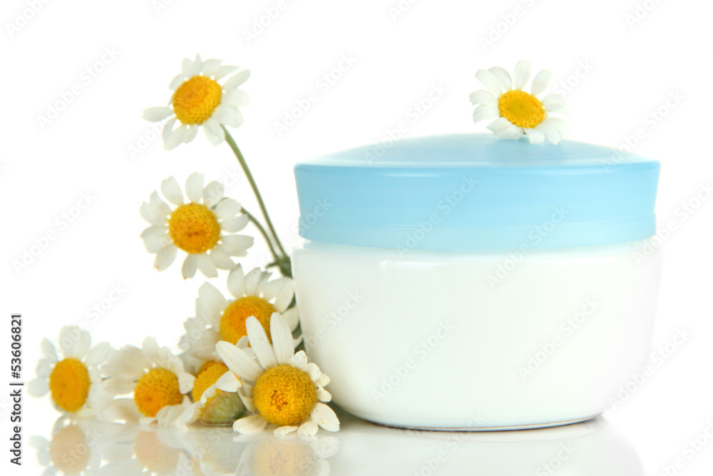 Cosmetic cream with wild camomiles, isolated on white Cosmetic cream with wild camomiles, isolated on white