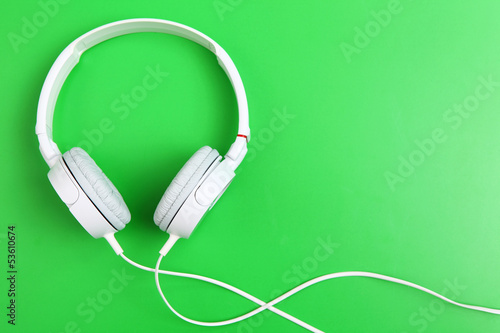 Headphone on green background