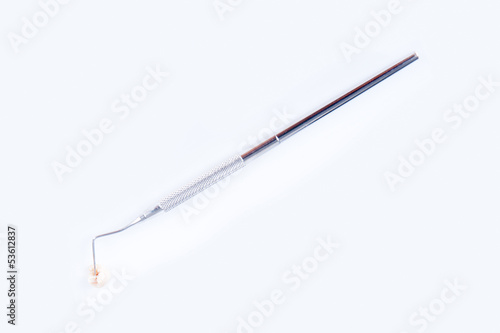 Wallpaper Mural Tip of dental probe on real human extracted tooth Torontodigital.ca