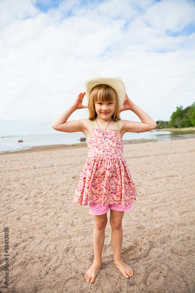 Smiling young girl at beach