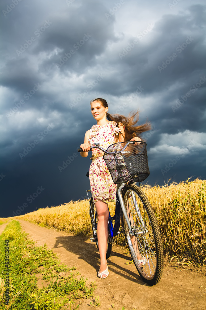 Obraz premium woman with bicycle