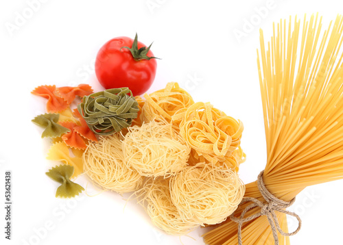 different pasta and tomato on a white background