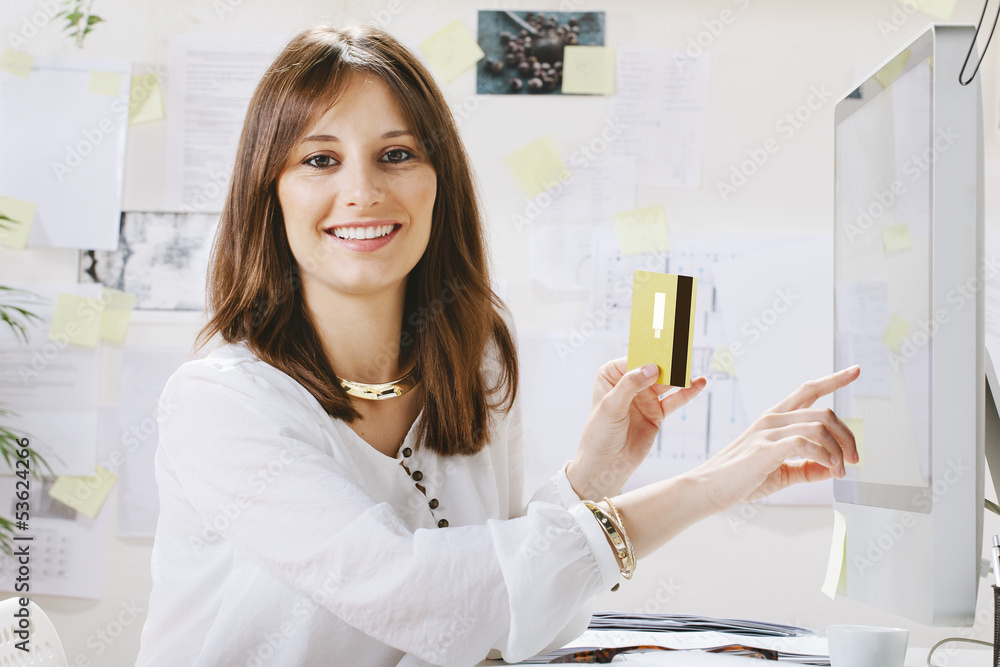Young woman creative designer making payments online. Young woman creative designer making payments online.