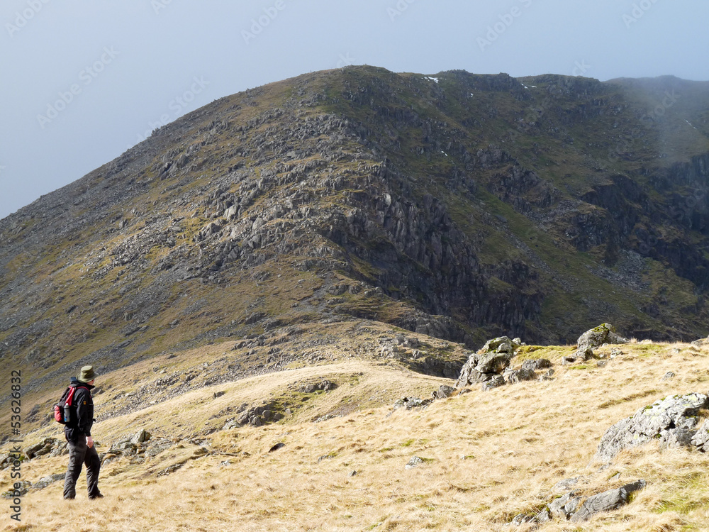 A hiker looking up the Pillar, in the Lake District