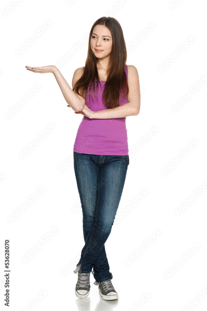 Female in full length holding blank copy space at her palm Female in full length holding blank copy space at her palm