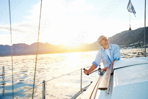 sunrise sailing boat